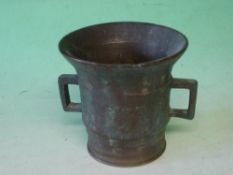 An Oriental Bronze Mortar Of archaic two handled form. 4" high