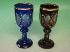 Bohemian Glass Two overlaid goblets, cut, etched and enriched with gilding. 8" high