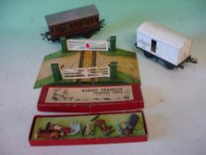 A Hornby O Gauge Tinplate Level Crossing together with a guard's van, truck and a Dorset Products