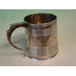 A William IV Silver Mug The body with two reeded bands. London 1832-33. 2 ¾" high. 4ozs 2 dwts