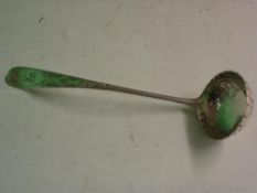 A Silver Toddy Ladle with bright cut and engraved handle, the bowl chased with foliage. Edinburgh