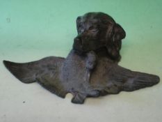 A Bronze Inkstand Realistically modelled as a retriever with duck. Early 20th century. 11 ¼" wide