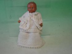 A Baby Doll Composition with jointed limbs, 5 ½" high