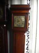 An 18th Century Oak Longcase Clock 30 hr movement. The 11" dial with silvered chapter signed Jn.