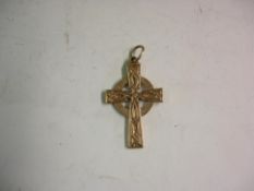 Gold Crucifix 9ct. Of Celtic form.7.4 grms