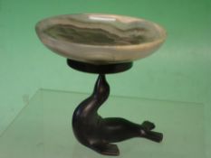 An Art Deco Bronze and Alabaster Tazza Modelled as a sea lion, balancing the bowl on his nose.