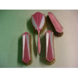 A Three Piece Brush Set Silver and guilloche enamel, together with a plated clothes brush