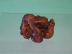 A Japanese Netsuke Carved as a group of five mice. Signed