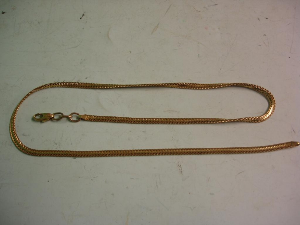 A Gold Necklet. Marked 750. 13.8 grms