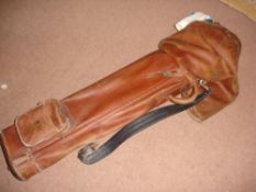 A Leather Golf Bag With a selection of clubs