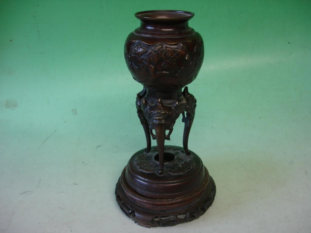 A Japanese Bronze Vase. Meiji. Relief decoration of birds and prunus, raised in mythical beast