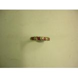 A Ruby and Diamond Seven Stone Ring Marked 375