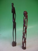 African Art Two figural wood carvings, the taller 19" high.