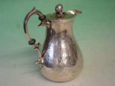 A Victorian Silver Baluster Hot Water Jug The lid with fruit finial, the body with cartouche