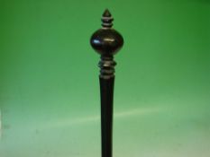 An Ebony Walking Stick The grip turned as a slightly compressed sphere with pointed finial. Possibly