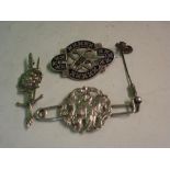 Three Silver Brooches. Together with a tie pin