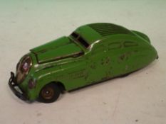 A Schuco Kommando Anno 2000 Car Voice activated. Green paint. 5 ½" long