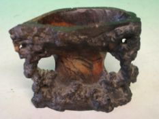 An Oriental Soapstone Brush Water Pot Naturalistically carved with rockwork. 3 ½" high