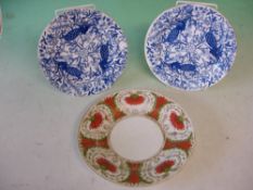 A Pair of Derby Plates Decorated in blue and white with peacocks amid radiating foliage 8" diam. (