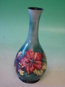 Moorcroft Pottery A Hibiscus baluster vase. Bears paper label. 10 ¼" high