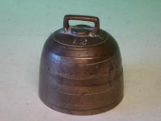 A Bronze Bell With line decoration and stamped "12" 3 ½" diam