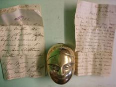 A 19th Century Brass Box The hinged lid cast with a female mask and stamped "Lord Wrottesley"
