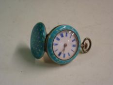 A Fob Watch Silver gilt and enamel. 28mm diam