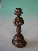 An Eastern Cast Brass Figure He with his hands together in prayer. 5" high