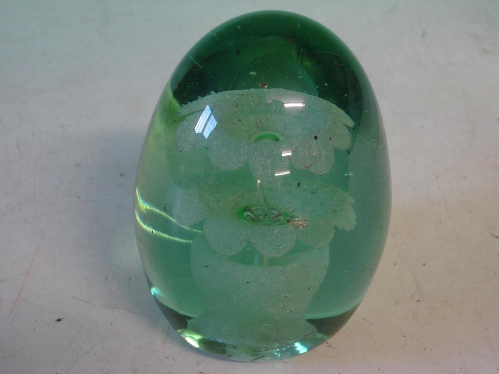 A Victorian Dump Weight The inclusion two tiers of flowers in a pot. 4 ½" high. (Slight chips)