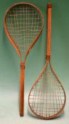 Pair of early children’s one-piece play rackets, with the original stringing, leather neck collars