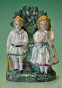 Original Vic Staffordshire ceramic cricket group of figures – comprising a boy holding a cricket bat