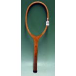 Fine unnamed Bussey wooden tennis racket fitted with an unusual wavy concave wedge (no strings)