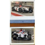 Signed Jensen Button Formula One racing photographs driving for BAR both action shots in colour