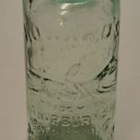 Horseracing – a Vic glass codd bottle c/w marble stopper retailed by Howards Manchester with