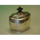 Silver Tea Caddy of oval form, the lid with wood finial. Sheffield 1907. 4 ¾" high. (Dents) 5ozs
