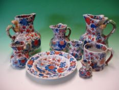 Mason's Ironstone. Six hydra jugs (minor chips) a bowl and a mug. All in Imari palette, the