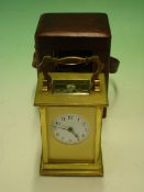 A French Gilt Brass Carriage Timepiece The enamel dial with Arabic numerals. 8 day movement with