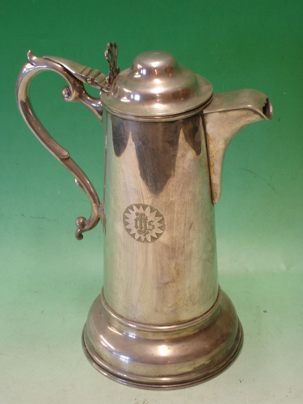 Silver Plated Coffee Pot of plain cylinder form. Engraved initials. 12" high