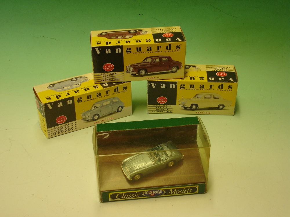 Three Lledo Vanguards Models - Austin 7 Mini; Rover P4; Ford 100E, together with a Corgi Austin