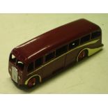 Dinky Toys. A luxury coach. 4 ½" long. Areas of re-painting
