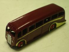 Dinky Toys. A luxury coach. 4 ½" long. Areas of re-painting