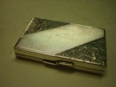 A Silver (835) Card Case, Engine turned and chased with foliage. 3"wide.