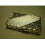 A Silver (835) Card Case, Engine turned and chased with foliage. 3"wide.