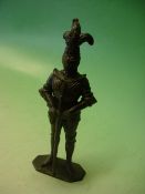 A Britannia Metal Table Cigar Lighter in the form of a knight in armour. 8" high