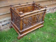 A Walnut Music Canterbury Now lacking divisions having been converted to a jardiniere with metal