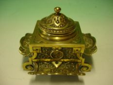 Brass Inkwell decorated with repousse scrolls and classical portrait medallions. 19th century.
