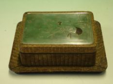 A Japanese Box and Stand. Straw-work and lacquer, the cover with plated plaque embossed with a