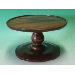 Mahogany Lazy Susan. The round top with moulded raised rim, raised on a bulbous support and