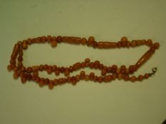 Amber Jewellery. A bead necklace C. 1900. 32g gross