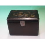 A Japanese Lacquer Tea Caddy. The lid decorated with birds and prunus, enclosing a pair of caddies